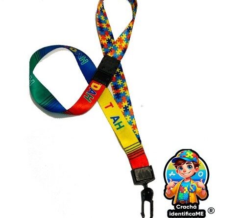 Cordão Dupla Face TDAH + Autismo com trava anti-sufocamento e símbolos de girassol e quebra-cabeça, ideal para identificação segura.